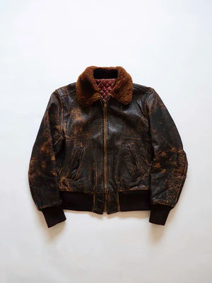 Vintage Leather jacket—likely horsehide—made in the USA. Features a Talon zipper.
Condition: Good; the leather shows some small tears.