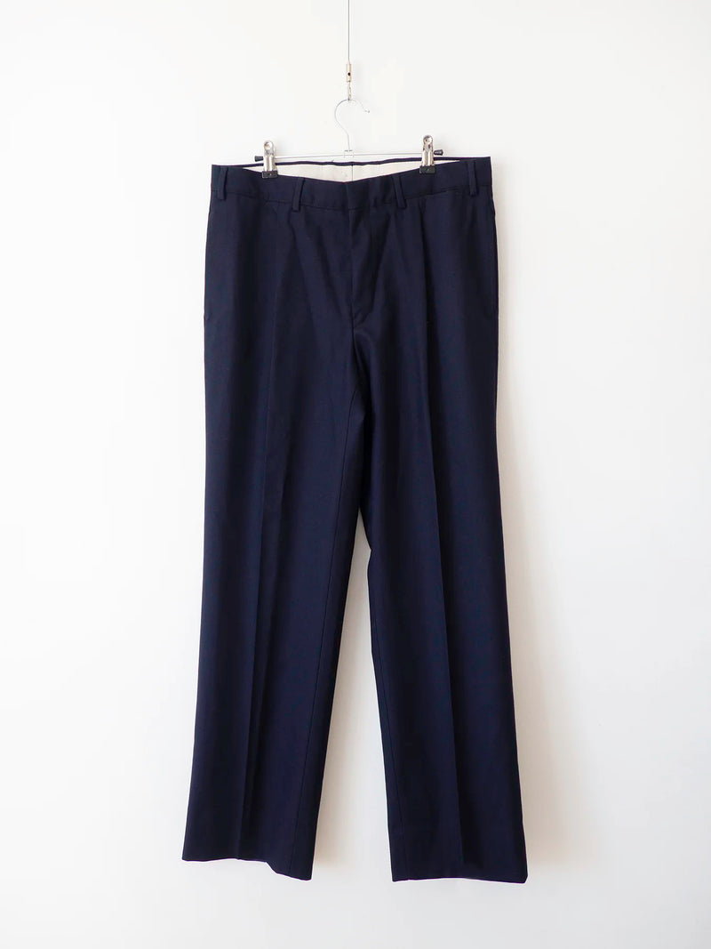 Pantaloni Marina Militare Italiana blu navy in lana, vista frontale su gruccia
