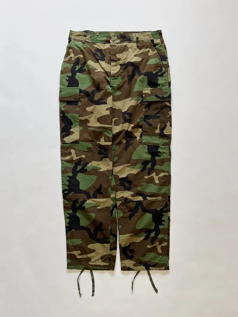 Vintage US Army Woodland Ripstop Cargo Pants.Woodland camouflage cargo pants were introduced by the US Army in the early 80s and were used for over two decades.