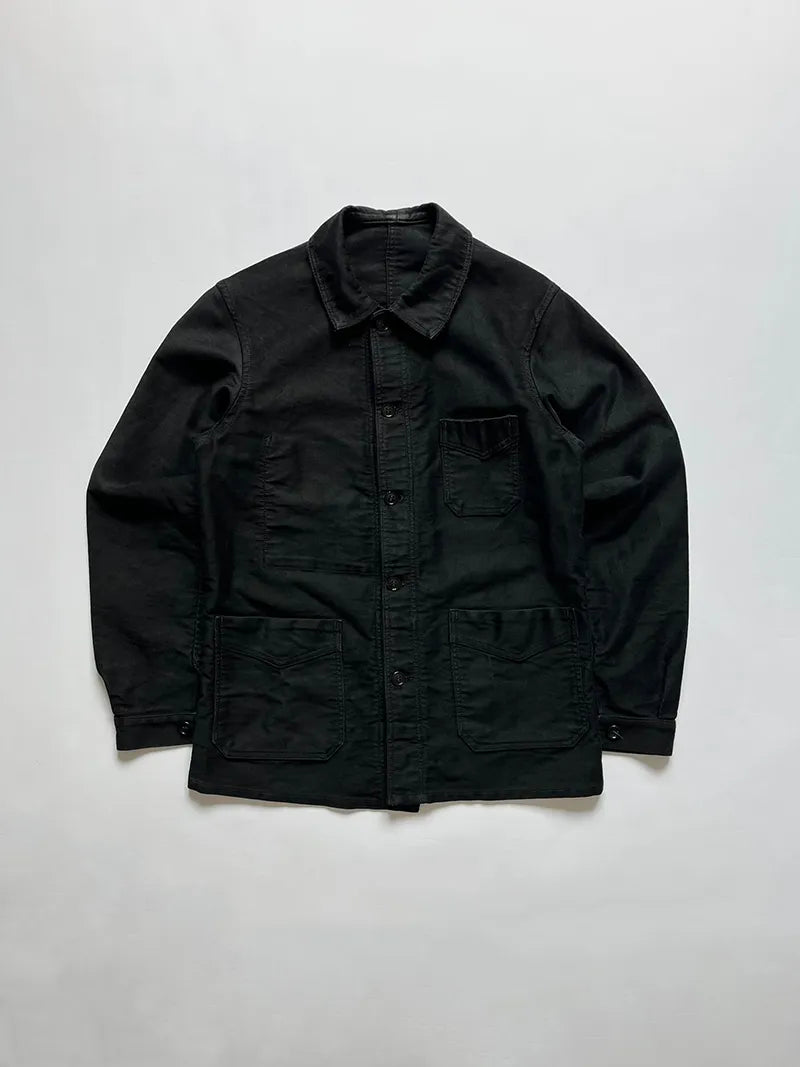 40s Vintage french work jacket in black moleskin by Tigra. Wide round collar, trapeze silhouette, V-shaped pockets and embroidered label. Size Small.