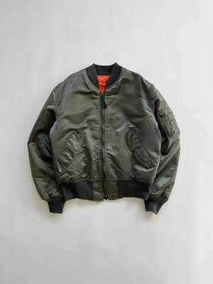 Vintage MA1 Bomber Jacket 80s. Size Medium/Large. Made in USA. Corinth MFG. A true vintage piece of American military history. Reversible orange interior.