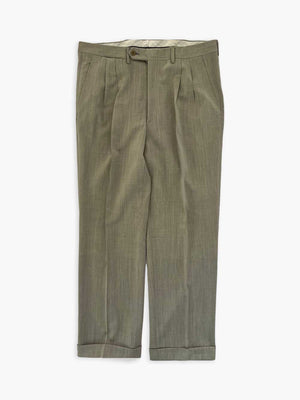 Vintage pleated artisan trousers, Milan channels. Placed on a neutral white background