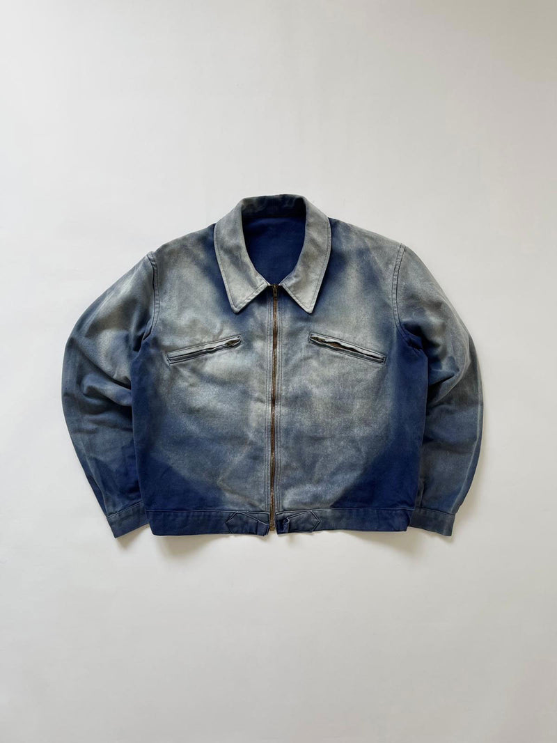 French cyclist jacket from the 50s in classic blue workwear cotton. Unique color nuances and prophete zip. A garment that embodies true French workwear. 