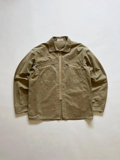 French cyclist jacket La Cigogne dated 60s/70s. Made in beige work cotton. The front closure is entrusted to an original ECLAIR zip. Size Large.