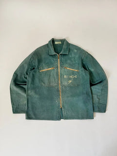 French cyclist jacket La Cigogne dated 60s/70s. Made in classic blue work cotton. The front closure is entrusted to an original ECLAIR zip. Size Large.