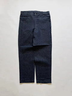 Raw denim supplied to the Italian Navy in the 1990s. High-waisted and slightly tapered. Completely deadstock. Button and zip closure. Size W34 L32.