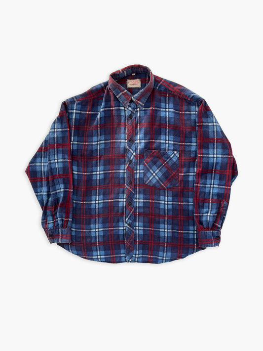 Vintage flannel shirt blue. Quality cotton and perfectly maintained over time. The shirt represents the perfect 90s style with its fabric and its colors