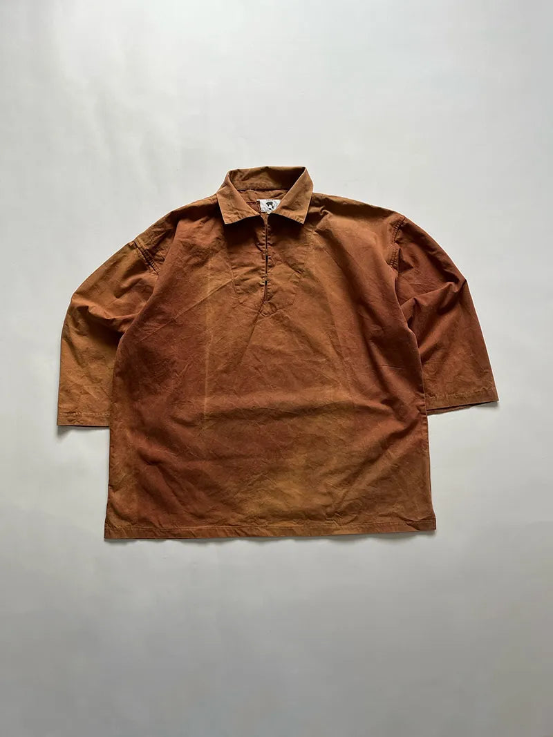 Fisherman Smock salmon color. Beautiful patina. Produced approximately in the 2000s. Size X-Large, in good general condition. A unique faded color.