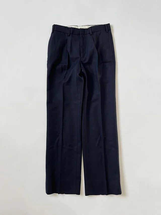 Vintage 1999 Italian Navy Wool Trousers. Pants made of 100% wool, intended for the Italian Navy. The color is navy blue, straight fit. Made in Italy - 1990s.