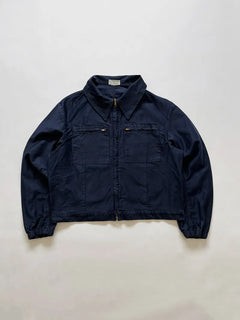 Vintage Italian Navy blue work jacket in 100% cotton. Boxy construction with two zip pockets. Made in the 1980s. Deadstock. Size medium.