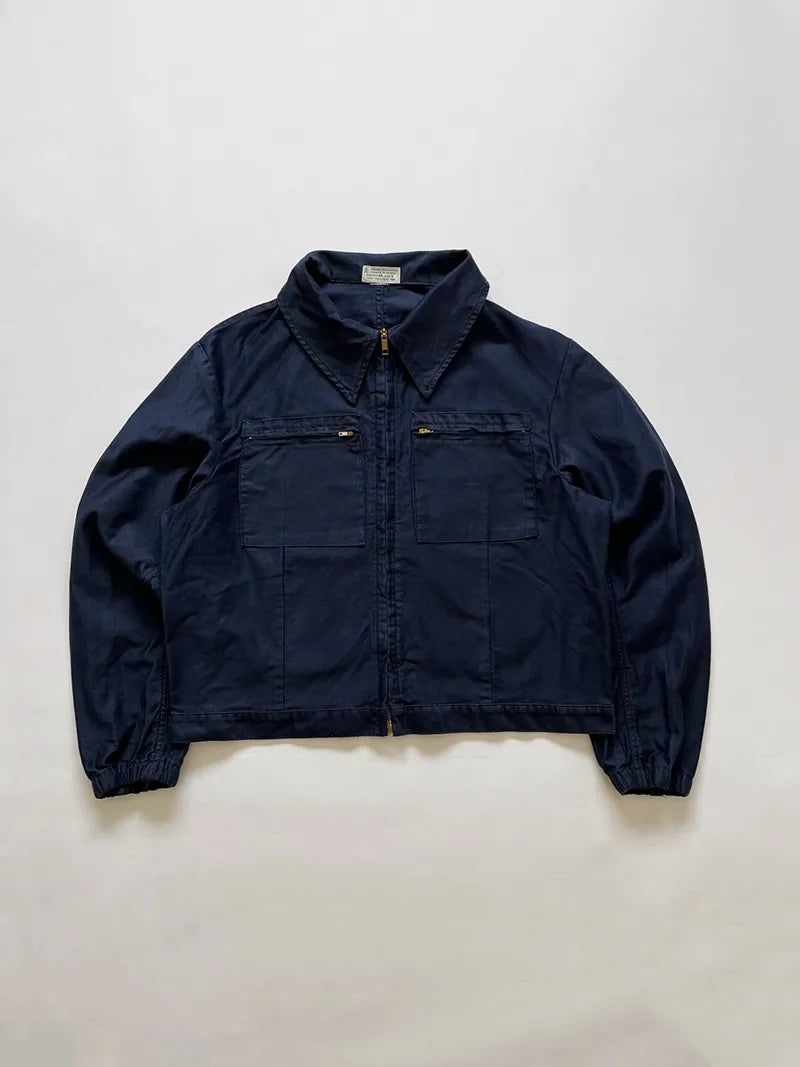 Vintage Italian Navy blue work jacket in 100% cotton. Boxy construction with two zip pockets. Made in the 1980s. Deadstock. Size medium.