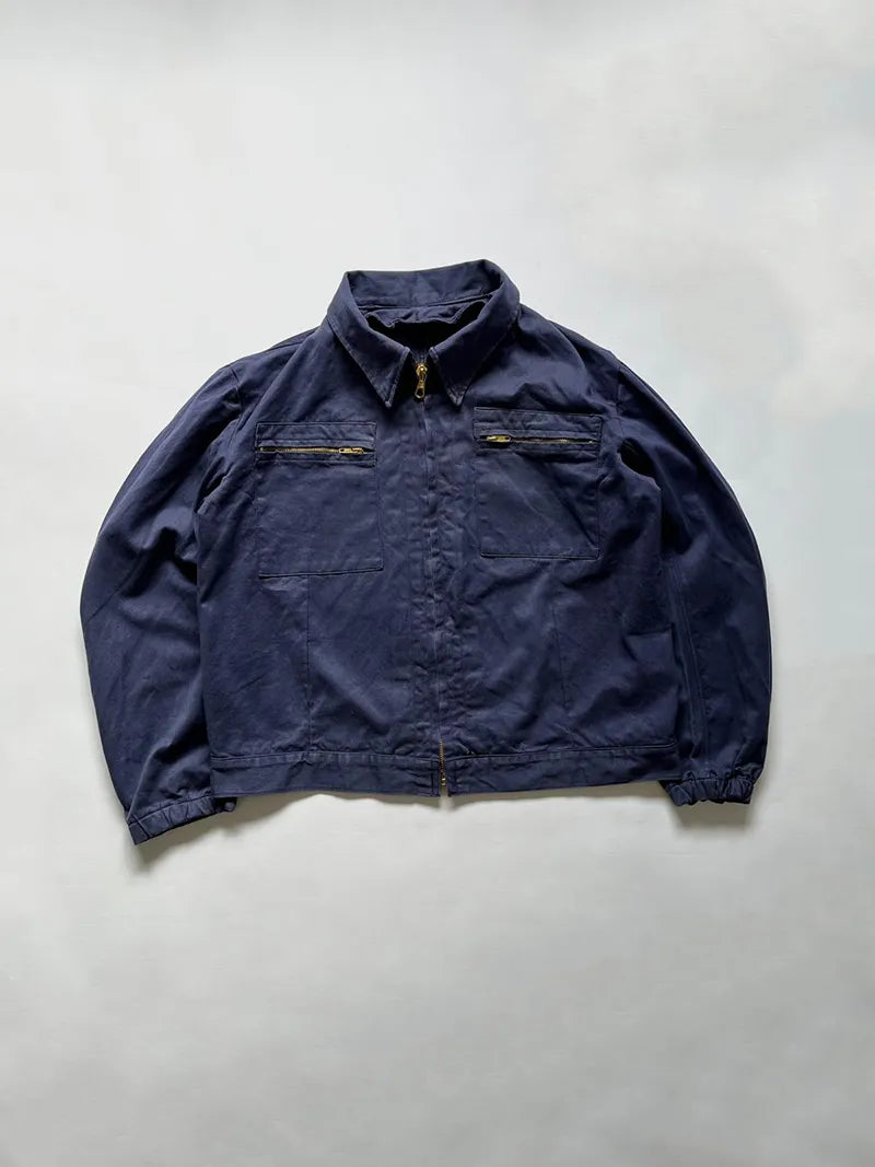 Vintage Italian Navy blue work jacket in 100% cotton. Boxy construction with two zip pockets. Made in the 1980s. Deadstock. Size large.