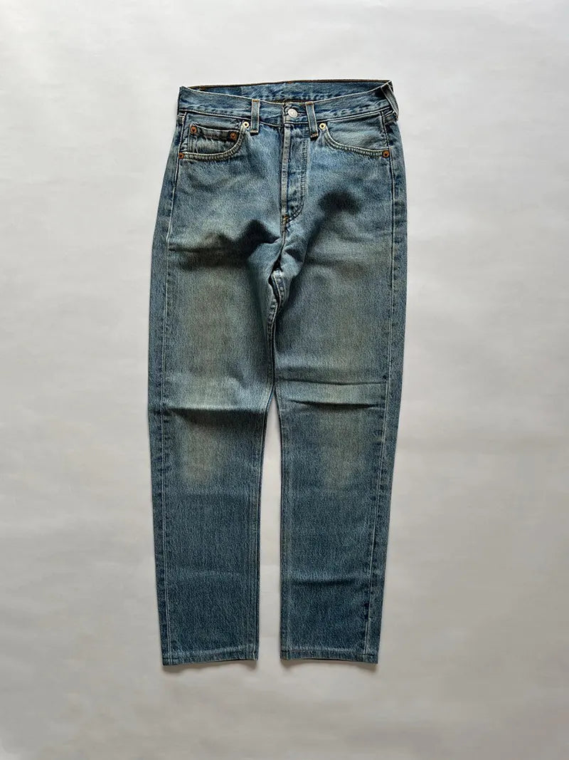 Levi's vintage 501 light blue size W28 L30. Step into timeless style with this authentic vintage light blue Levi's 501 from the 90s, proudly made in UK. 