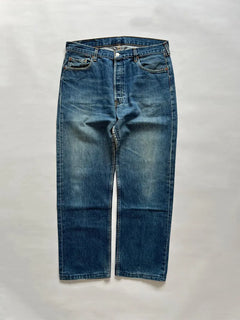 Vintage Levi's 501s in dark blue with beautiful color gradients. Made in France in the 1990s. 