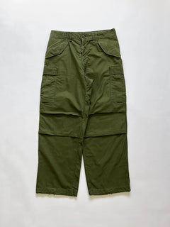 Vintage M-65 field pants from the 70s, Serval Zip. Introduced in 1965 during the Vietnam War, the M-65 pant represents the evolution of the M-51 model.