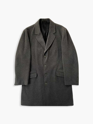 Elegant handcrafted vintage overcoat expertly made in Italy using traditional techniques and high quality materials. Color Melange Gray. Produced in 1990. 