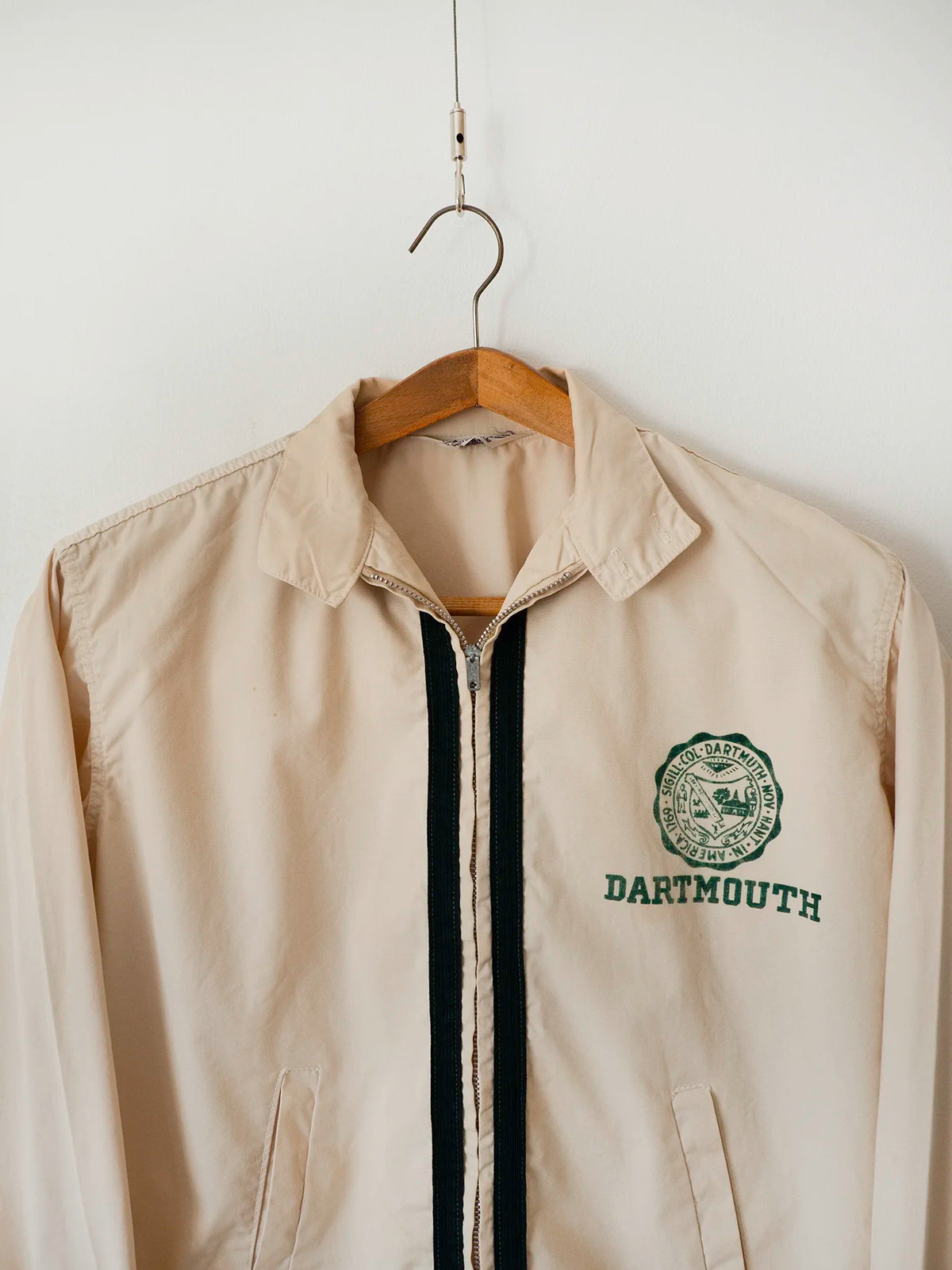 Close-up of the collar, front zip and Dartmouth College seal patch on this vintage JEM Jackets Harrington jacket.