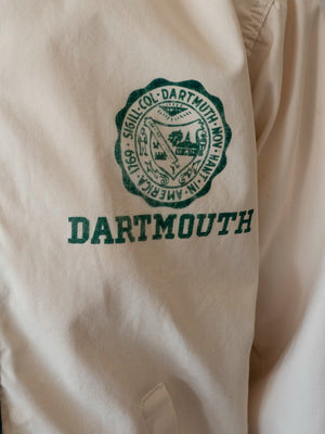 Detail of the Dartmouth College seal reading Sigill Col Dartmouth America 1769, printed on the jacket's chest.