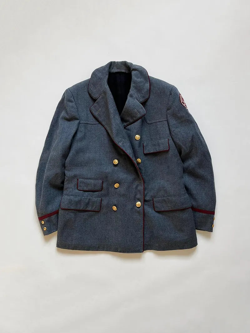 Vintage U.S. Post blue wool twill uniform, worn approximately in the 1950s. Features a patch reading "Post Office Dept. U.S.A." Made by Fechheimer Uniforms. 