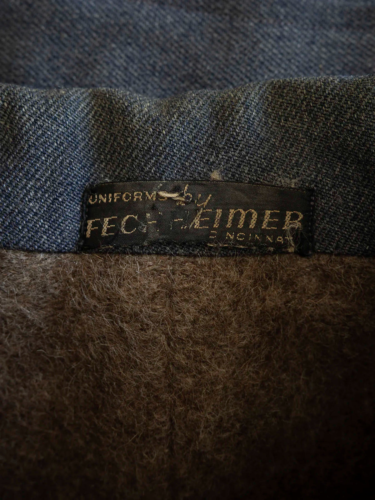 Etichetta originale Uniforms by Fechheimer, Cincinnati